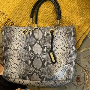 faux snakeskin bag by Cythia Rowley